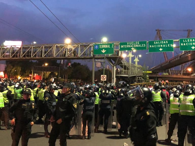Policías federales levantan bloqueo en AICM