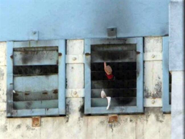 Confirma Piñera 83 muertos por incendio en cárcel