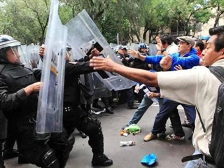 Otorgan libertad a integrante de la CNTE que agredió granadero