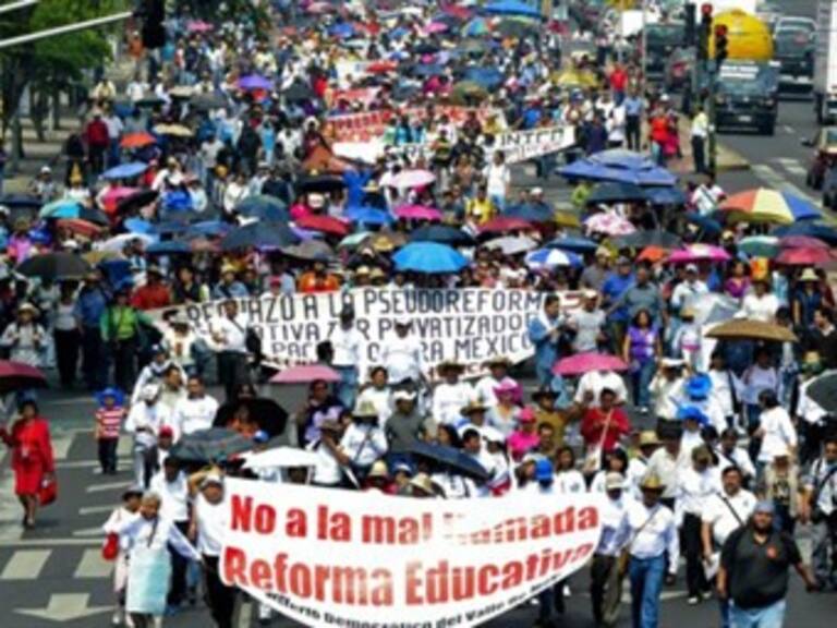 Saldo Blanco en la marcha a un año de la toma de protesta de Enrique Peña Nieto