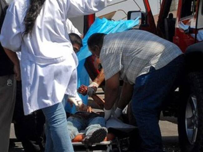 Hallan muertos a dos sacerdotes en un vehículo en Bogotá