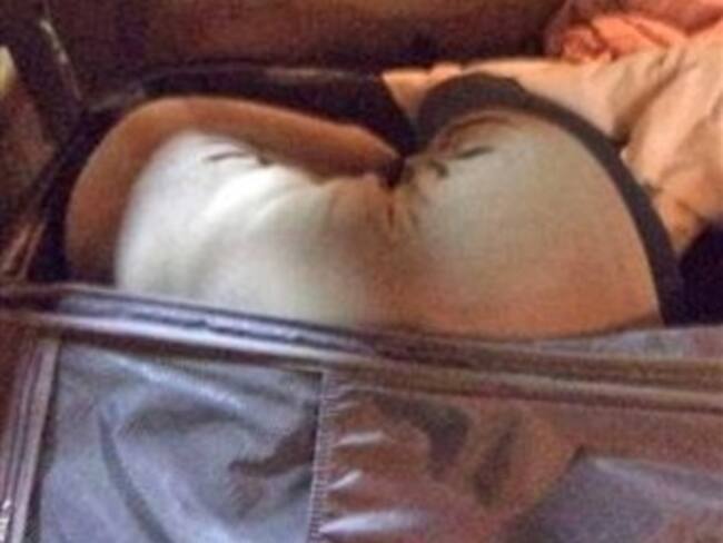 Encuentran a mujer oculta en una maleta en la frontera México-EU