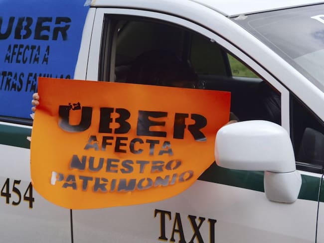 &quot;Exageran&quot;, dice AMLO por conflicto de taxistas con Uber en Cancún