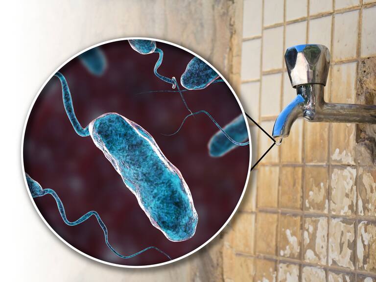 Safety of drinking water. Conceptual illustration and photo showing bacteria Vibrio cholerae in a drop of water from an old street tap.