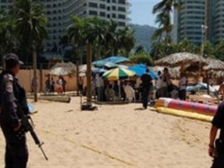 Violan 5 hombres armados y encapuchados a turistas españolas en Acapulco