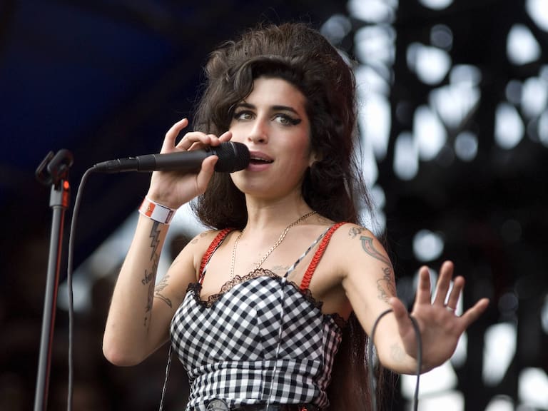 Mx - Amy Winehouse. (Photo by Daniel Boczarski/Redferns)
