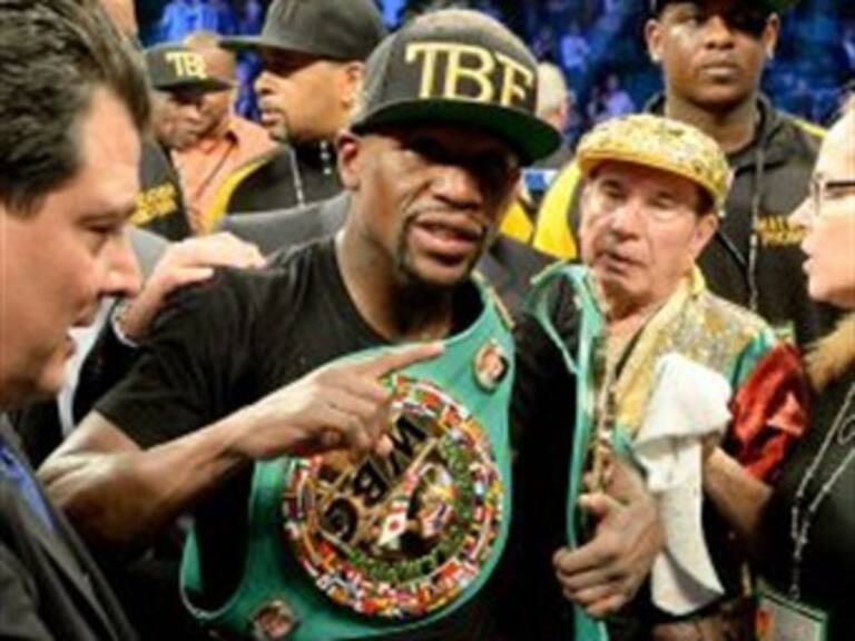 Derrota Mayweather a Maidana y se mantiene invicto