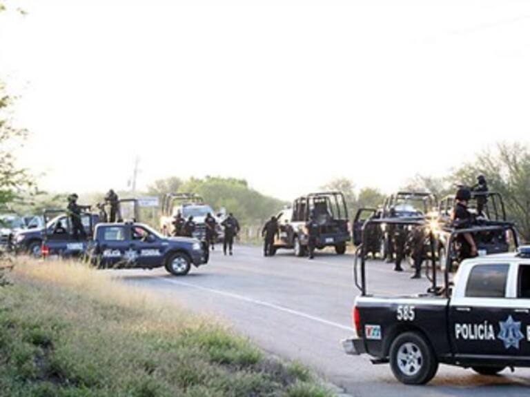 Responde gobierno a mantas tras masacre en Cadereyta