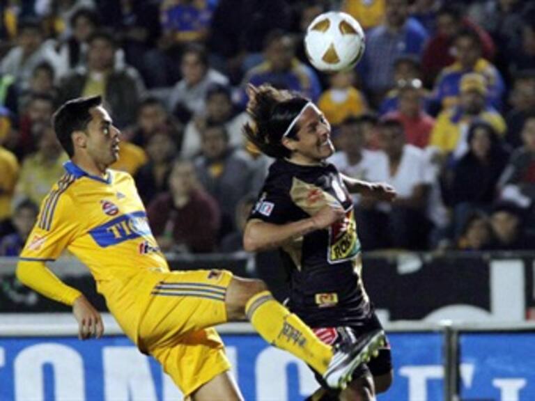 Habitantes de Nuevo León y Michoacán prestaron atención este domingo al partido Tigres-Monarcas