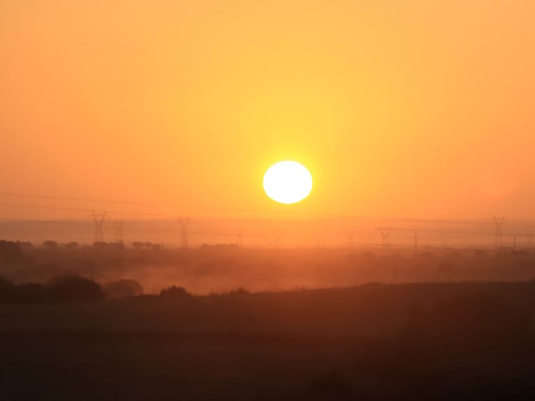 Harsh Morning Sun, power cables and haze