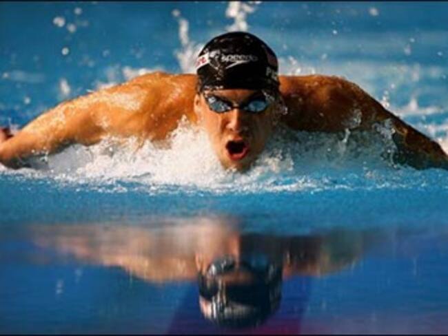 Oro y récord mundial para EU en equipo lidereado por Phelps