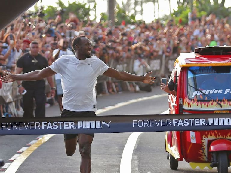 Usain Bolt contra el Moto taxi