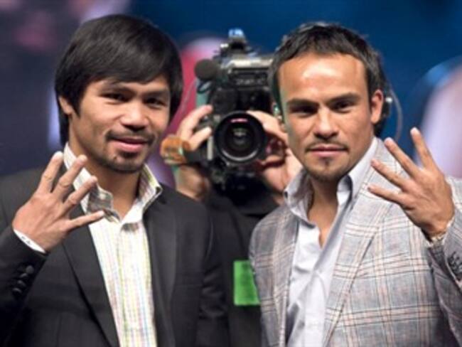 Arriban como héroes a Las Vegas Márquez y Pacquiao