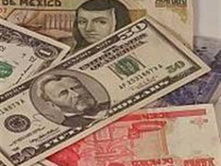 Cierra dólar hasta en 14.76 pesos pese a subastas del Banxico