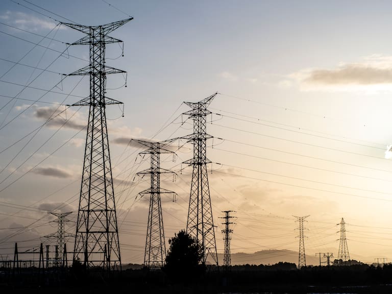 Electric towers next to a high voltage electric station in the city of Benejama, Alicante, Valencian Community, Spain. Europe.