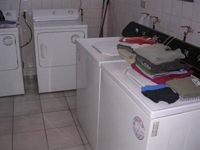 Muere niña atrapada en lavadora