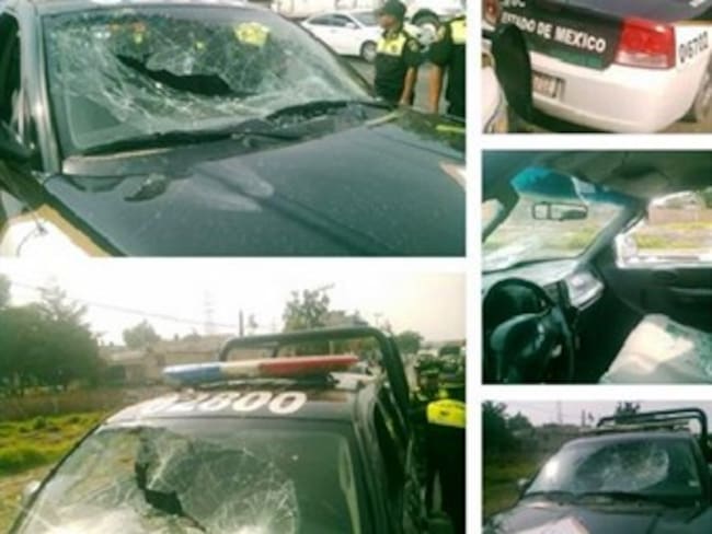 Destrozan maestros de la CNTE patrullas de la PF en Michoacán