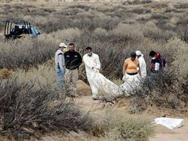 Hallan 14 cadáveres en fosas de Ciudad Juárez