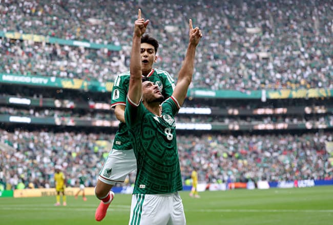Gilberto Mora y Raúl Jiménez